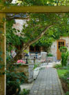 Pergola  Cottage style garden  Blue brick paving