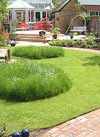 Circular lawn in a Contemporary garden, Modern garden Wellesborne